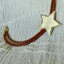 Load image into Gallery viewer, Handmade brass and leather bolo featuring a layered star center and hammer texture